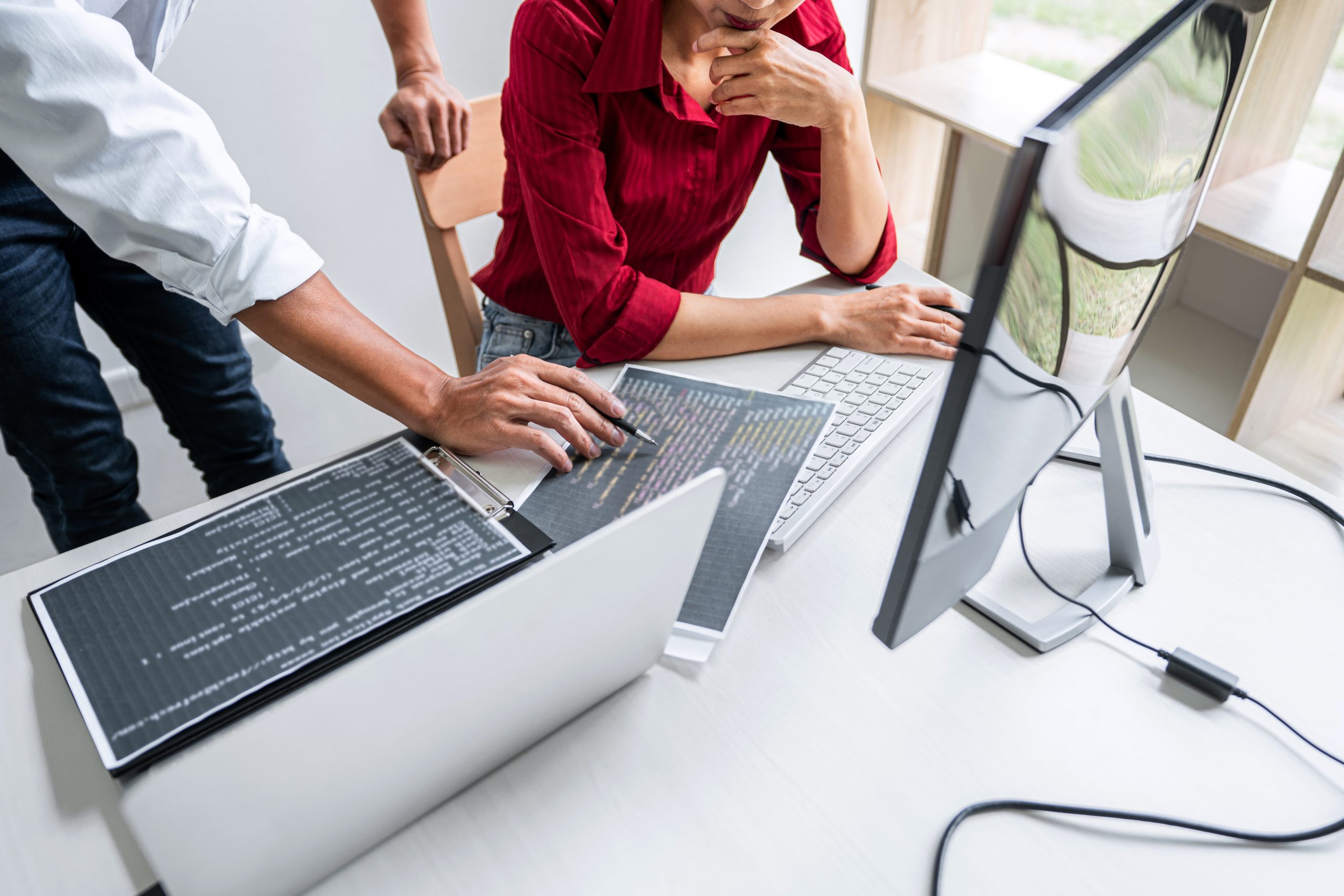 Researchers working together at a computer